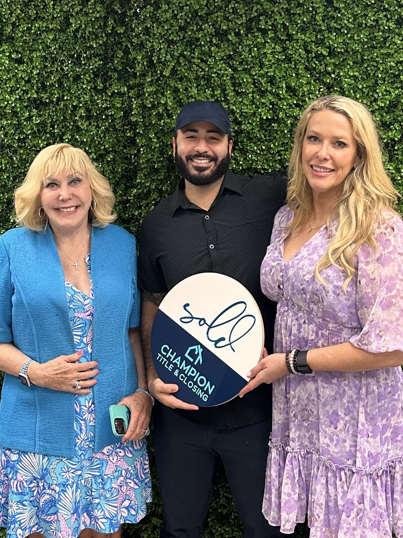 Alex Khalil with the Director of the Florida Division of Real Estate at closing